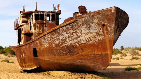 Rusty ship on the dry Aral Sea bed, Moynaq