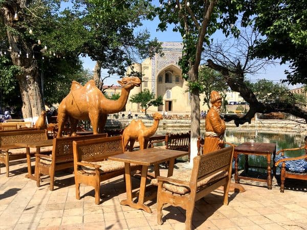 Lyabi-Hauz teahouse terrace with camel statues, Bukhara