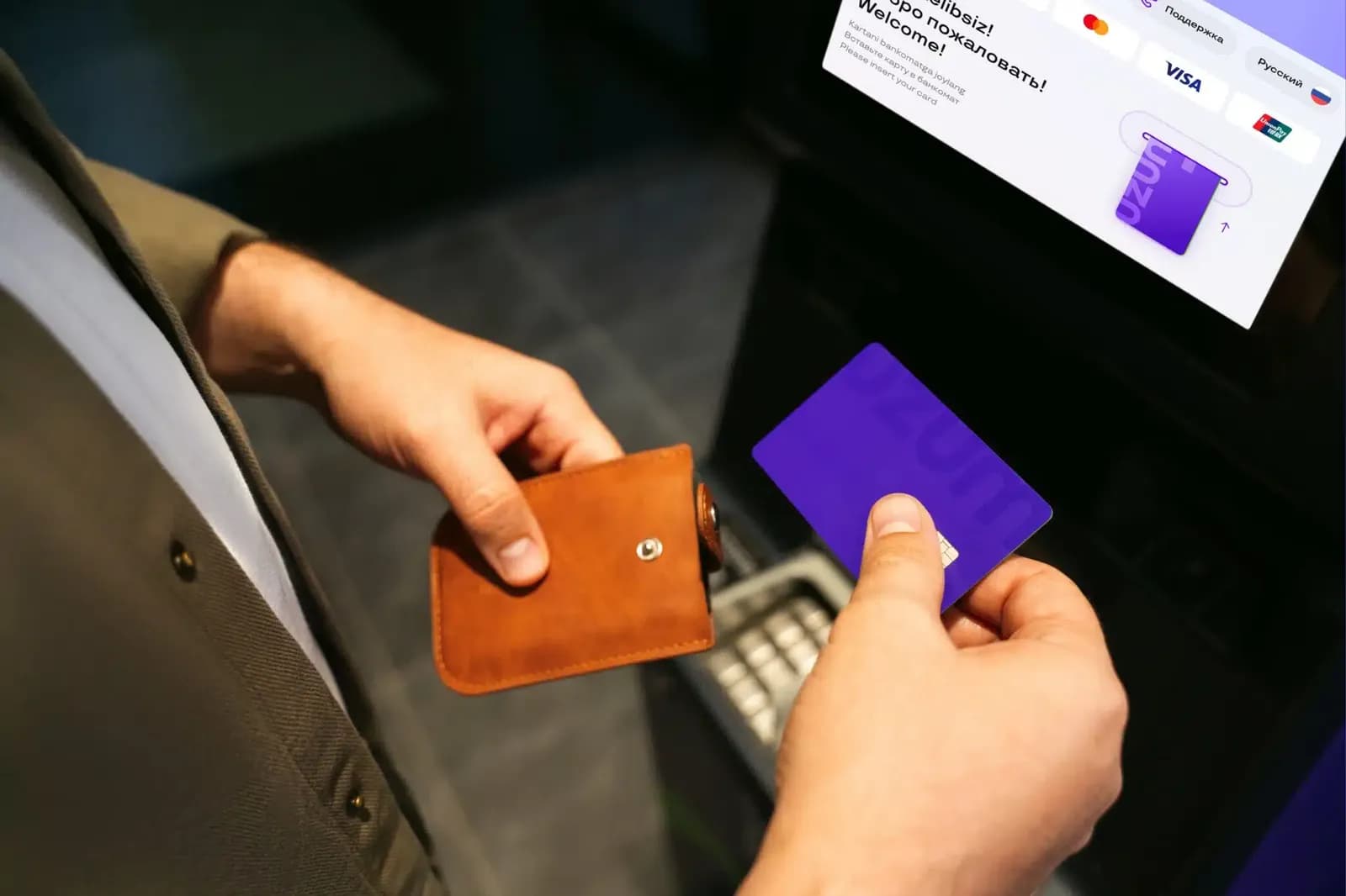 Paying with a local card at an ATM in Uzbekistan